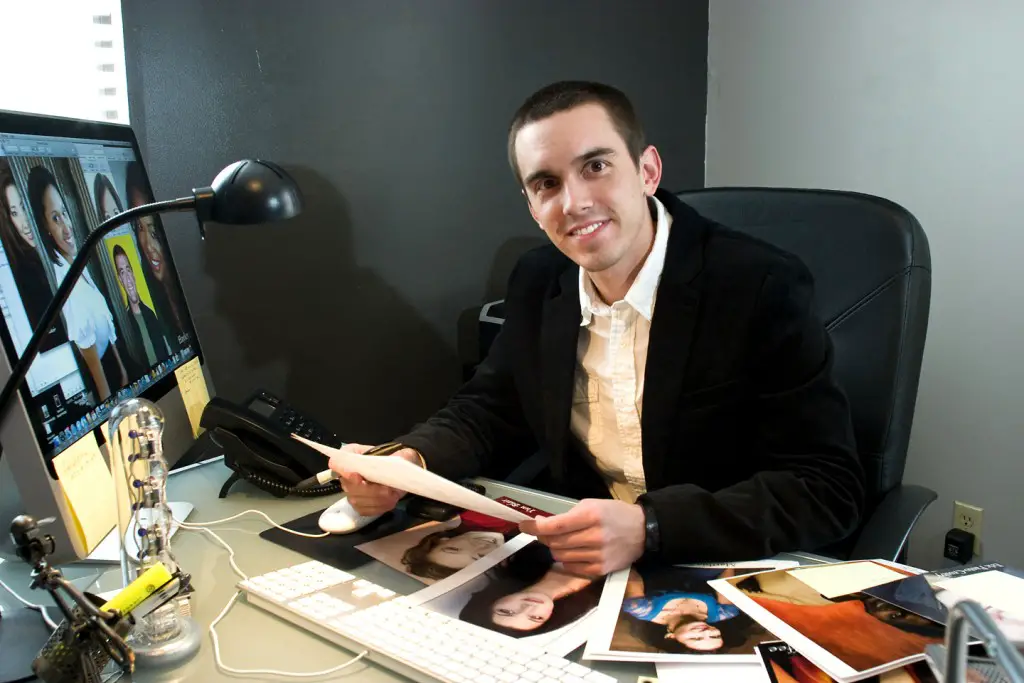 Staff at talent agencies going through head shots