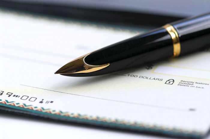 picture of a pen on a cheque