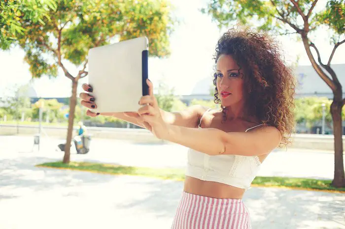 woman making selfie