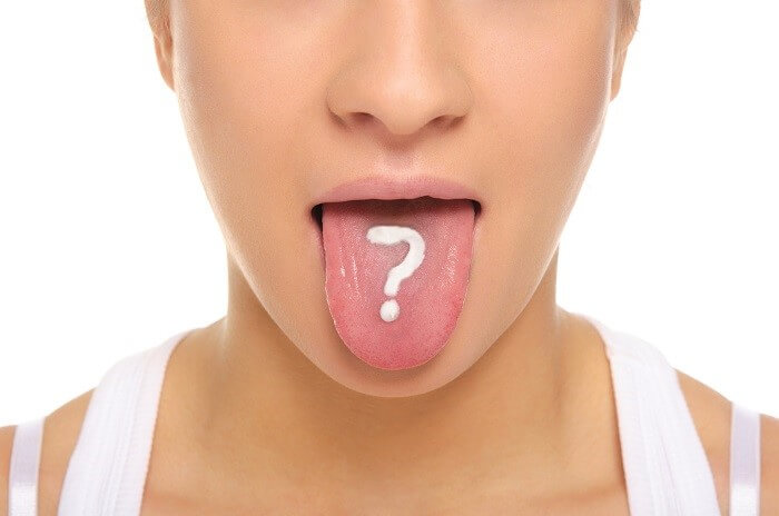 White question mark placed on a person's tongue