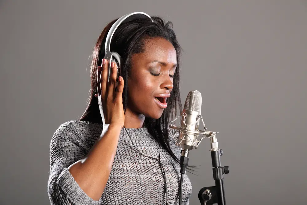 woman singing with headset